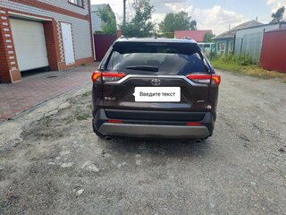 2021 Toyota RAV4 V (XA50), коричневый, 3850000 рублей, вид 2
