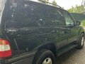 2006 Toyota Land Cruiser 100 Series Рестайлинг 2, чёрный, 1800000 рублей - вид 2