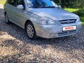 2004 Kia Rio I Рестайлинг, серебристый - вид 1