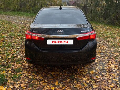 2013 Toyota Corolla XI (E160, E170, E180), синий, 1480000 рублей, вид 4