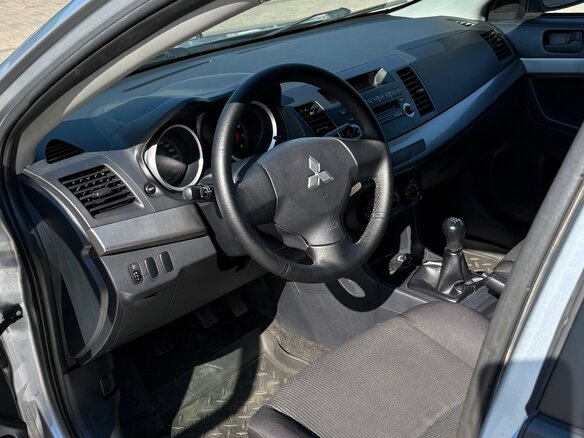 2007 Mitsubishi Lancer X, серебристый - вид 12