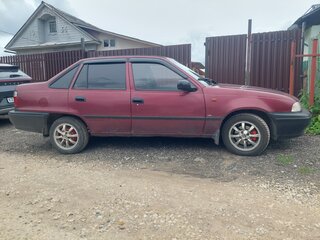 2005 Daewoo Nexia I, пурпурный, 170000 рублей, вид 2
