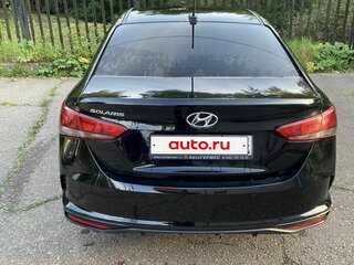2021 Hyundai Solaris II Рестайлинг, чёрный, 1740000 рублей, вид 2