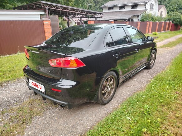2008 Mitsubishi Lancer X, чёрный - вид 4