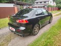2008 Mitsubishi Lancer X, чёрный - вид 4