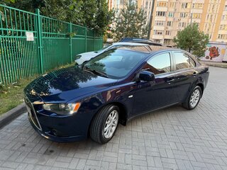 2012 Mitsubishi Lancer X Рестайлинг, синий, 910000 рублей, вид 1