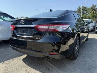 2023 Toyota Camry VIII (XV70) Рестайлинг, чёрный, 4100000 рублей, вид 4