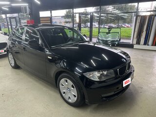2010 BMW 1 серии 116i I (E81/E82/E87/E88) Рестайлинг, чёрный, 650000 рублей, вид 1