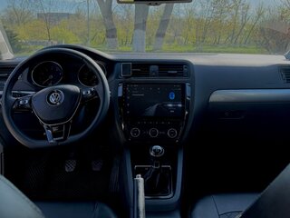 2015 Volkswagen Jetta VI Рестайлинг, серебристый, 1300000 рублей, вид 5