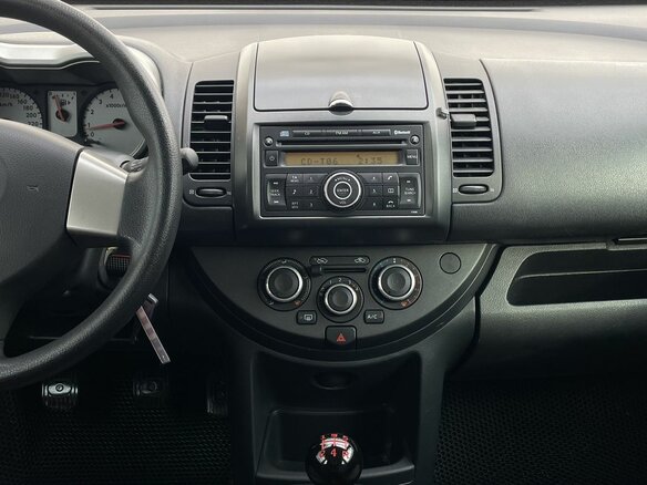 2008 Nissan Note I, серый, 600000 рублей - вид 16