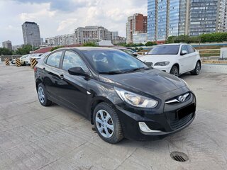 2014 Hyundai Solaris I, чёрный, 630000 рублей, вид 2