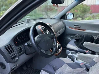 2004 Kia Carnival I Рестайлинг, чёрный, 365000 рублей, вид 4