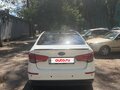 2017 Kia Rio III Рестайлинг, белый - вид 4