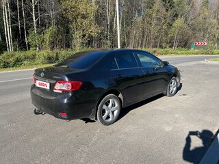 2011 Toyota Corolla X (E140, E150) Рестайлинг, чёрный, 770000 рублей, вид 3