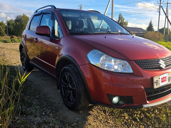 2010 Suzuki SX4 I (Classic) Рестайлинг, оранжевый, 645000 рублей - вид 4
