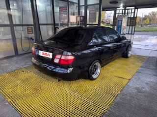 2004 Nissan Almera II (N16) Рестайлинг, чёрный, 260000 рублей, вид 3