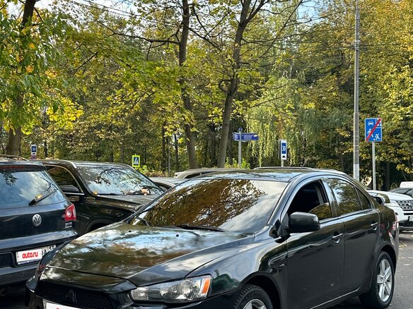 2008 Mitsubishi Lancer X, чёрный - вид 4
