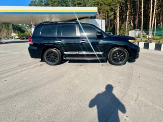 2012 Toyota Land Cruiser 200 Series Рестайлинг 1, чёрный, 4399000 рублей, вид 4