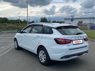 2023 Lada (ВАЗ) Vesta SW I Рестайлинг (NG), белый, 900000 рублей, вид 4