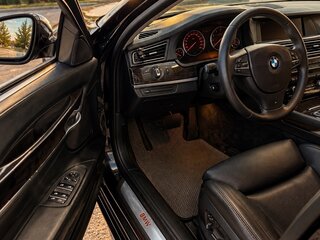 2009 BMW 7 серии 750i V (F01/F02/F04), чёрный, 955000 рублей, вид 5