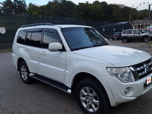 2014 Mitsubishi Pajero IV Рестайлинг 1, белый, 2100000 рублей - вид 1