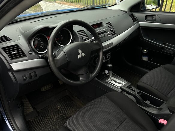 2010 Mitsubishi Lancer X, синий - вид 11