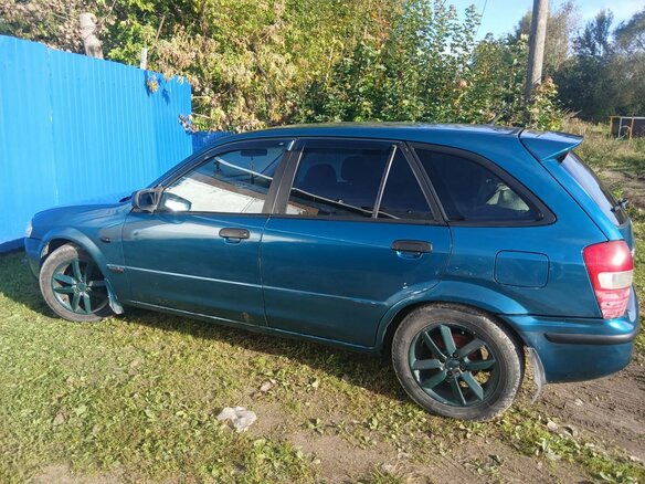 1999 Mazda 323 VI (BJ), зелёный, 130000 рублей - вид 1