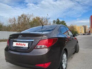 2016 Hyundai Solaris I Рестайлинг, коричневый, 950000 рублей, вид 3