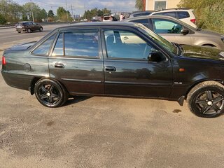 2011 Daewoo Nexia I Рестайлинг, чёрный, 287000 рублей, вид 1