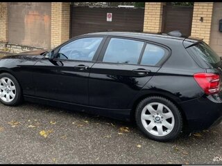 2011 BMW 1 серии 116i II (F20/F21), чёрный, 1200000 рублей, вид 2