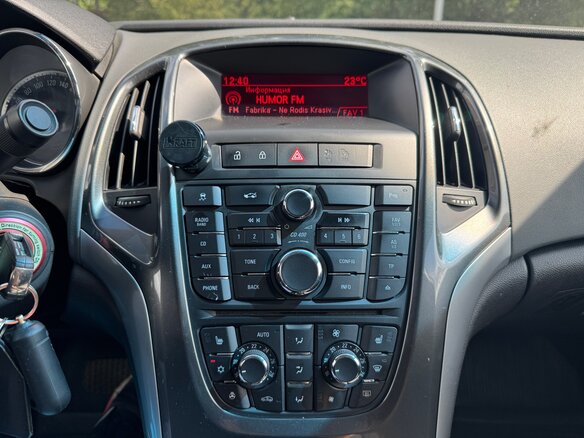 2013 Opel Astra J Рестайлинг, серебристый - вид 12
