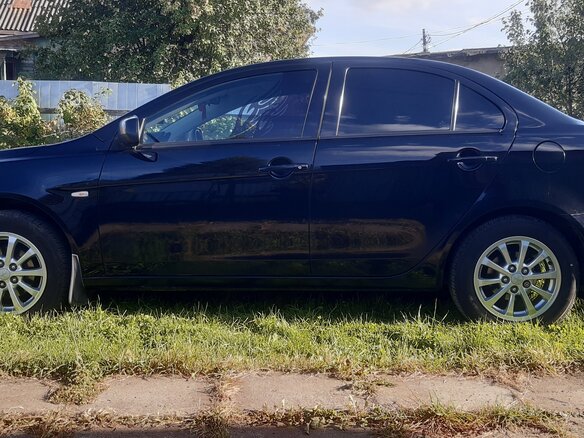 2012 Mitsubishi Lancer X Рестайлинг, чёрный, 1050000 рублей - вид 6