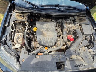2010 Mitsubishi Lancer X, чёрный, 414000 рублей, вид 2