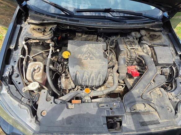 2010 Mitsubishi Lancer X, чёрный, 414000 рублей - вид 14