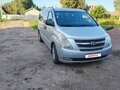 2009 Hyundai Grand Starex I, серый - вид 1