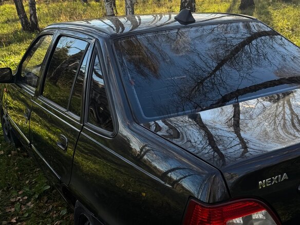 2011 Daewoo Nexia I Рестайлинг, чёрный - вид 7