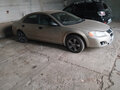 2004 Dodge Stratus II Рестайлинг, золотистый - вид 3