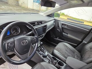 2018 Toyota Corolla XII (E210), белый, 1650000 рублей, вид 2