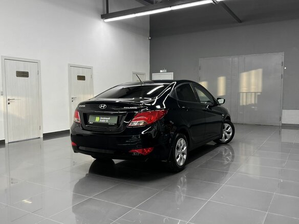 2014 Hyundai Solaris I Рестайлинг, чёрный, 930000 рублей - вид 1