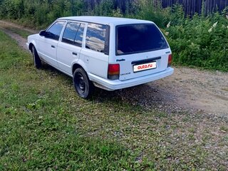 1990 Mazda Familia V (BF), белый, 165000 рублей, вид 2