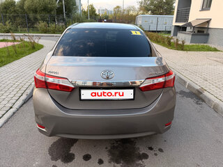 2013 Toyota Corolla XI (E160, E170, E180), золотистый, 950000 рублей, вид 3