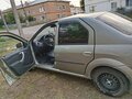 2012 Renault Logan I Рестайлинг, бежевый, 550000 рублей - вид 3