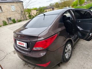 2016 Hyundai Solaris I Рестайлинг, коричневый, 600000 рублей, вид 2