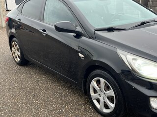 2012 Hyundai Solaris I, чёрный, 760000 рублей, вид 3