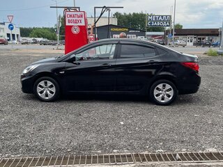 2013 Hyundai Solaris I, чёрный, 410000 рублей, вид 4