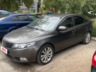 2010 Kia Cerato 6-speed II, коричневый, 720000 рублей, вид 4