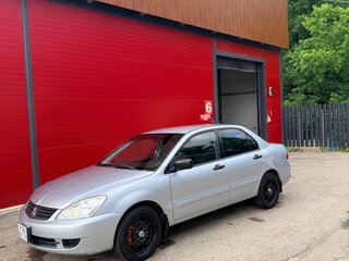 2009 Mitsubishi Lancer IX Рестайлинг, серебристый, 305000 рублей, вид 1