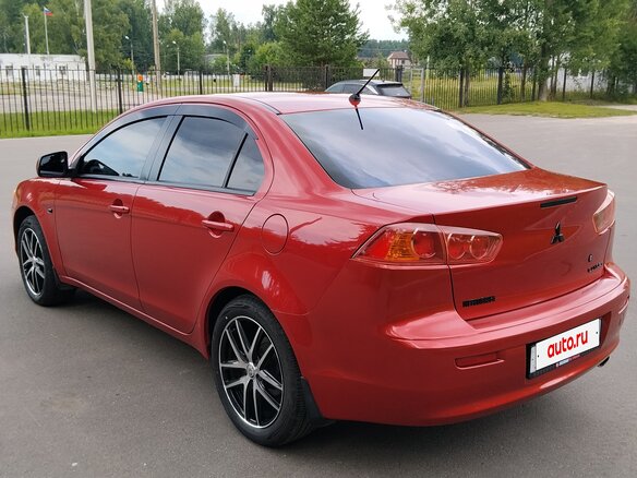 2008 Mitsubishi Lancer X, красный - вид 4