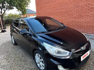 2013 Hyundai Solaris I, чёрный, 810000 рублей, вид 1