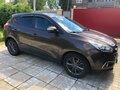 2015 Hyundai ix35 I Рестайлинг, коричневый - вид 1